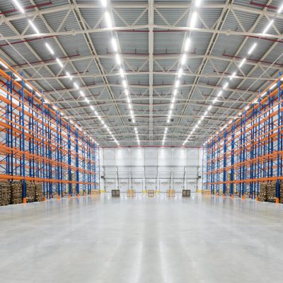 Industrial warehouse interior with racking and loading area